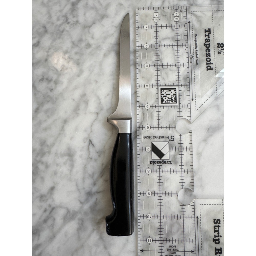 J.A. Henckels Four Star 5.5 inch Forged Boning Knife Black Handle Germany